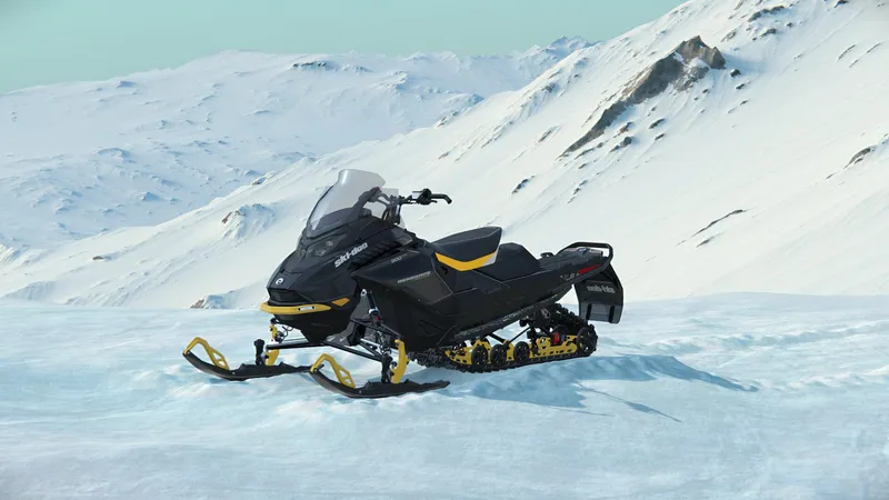 Slide: The Image of 2024 SKI DOO RENEGADE ADR ENDURO 900 ACE TURBO R snowmobile on snowy mountain terrain. - 7