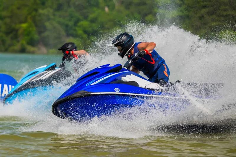 Slide: The Image of 2024 Waverunner GP SVHO A jet ski racing on water, creating dynamic splashes. - 5