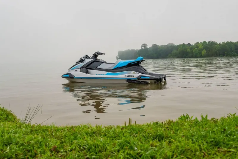 Slide: The Image of 2024 Waverunner VX CRUISER A jet ski on a calm lake. - 5
