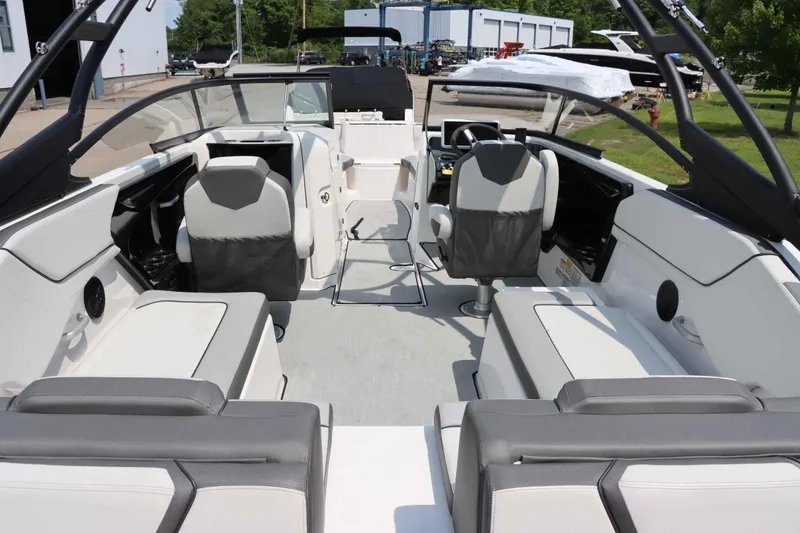 Slide: The Image of 2024 Yamaha AR250 boat interior with modern seating and sleek design. - 10