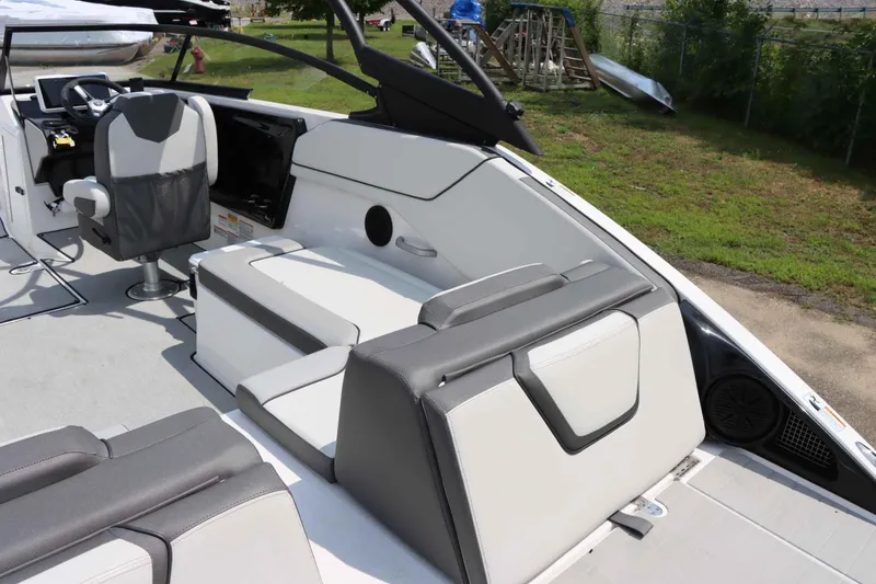 Slide: The Image of 2024 Yamaha AR250 boat interior with sleek seating and modern design. - 11