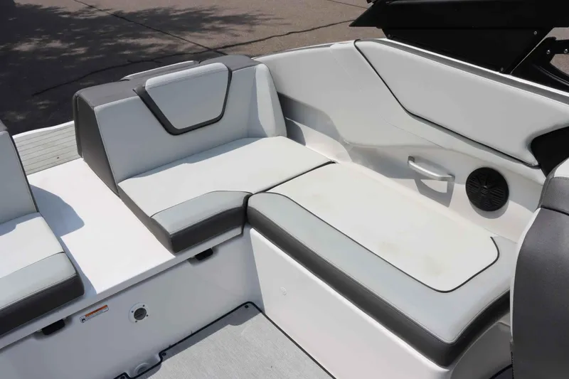 Slide: The Image of 2024 Yamaha AR250 boat interior with sleek, modern seating design. - 15