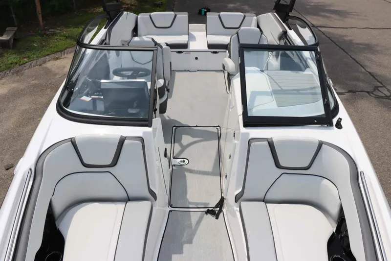 Slide: The Image of 2024 Yamaha Boats AR250 interior with sleek seating and modern design. - 29