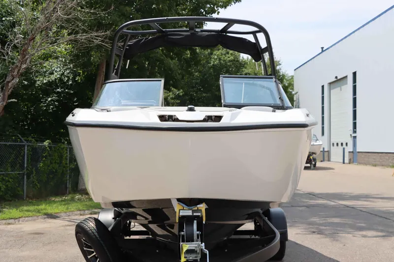 Slide: The Image of 2024 Yamaha Boats AR250 on trailer, front view, outdoors. - 3