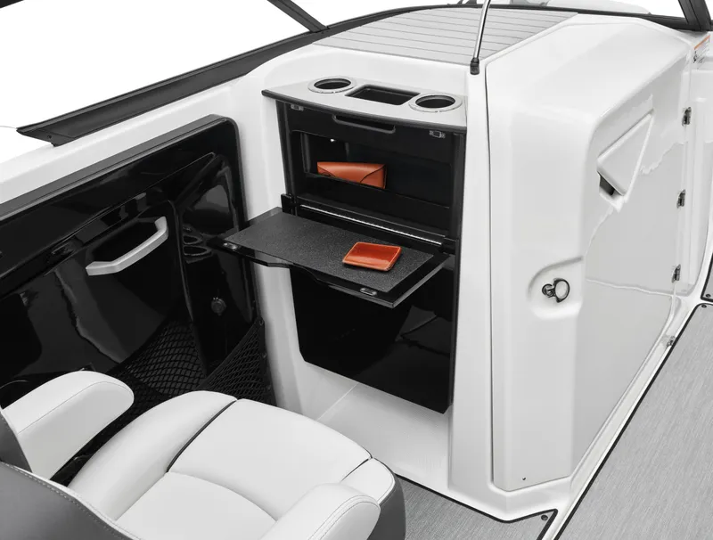 Slide: The Image of Interior of 2024 Yamaha Boats AR250, featuring storage compartments and seating. - 35