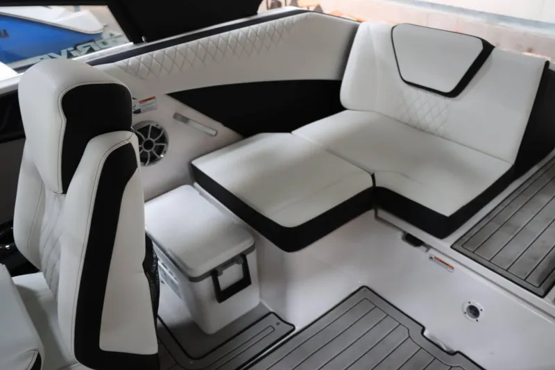 Slide: The Image of 2024 Yamaha Boats 222SD interior with white and black seating, modern design. - 17