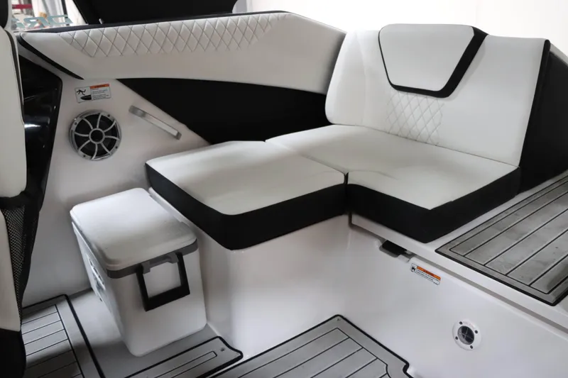Slide: The Image of 2024 Yamaha Boats 222SD interior seating with modern design and integrated speaker system. - 19