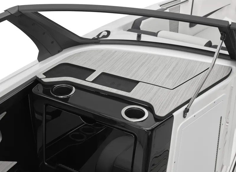 Slide: The Image of 2024 Yamaha Boats 222SD interior dashboard with cup holders and sleek design. - 27