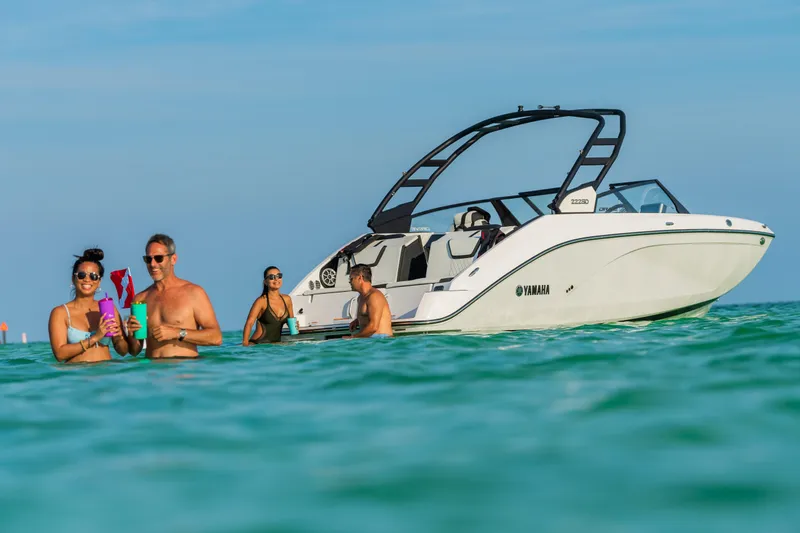 Slide: The Image of People enjoying the water near a 2024 Yamaha Boats 222SD. - 33