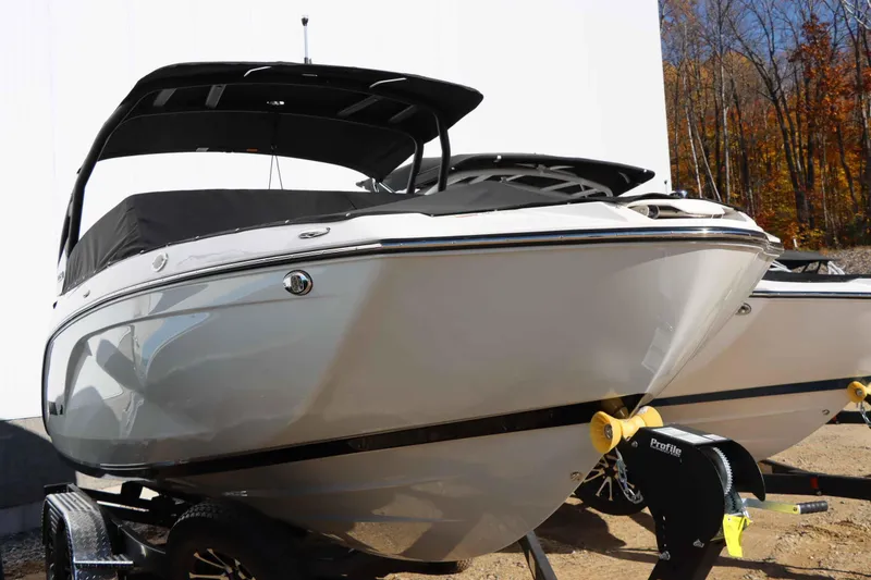 Slide: The Image of 2024 Yamaha Boats 222SD on trailer, sleek design, outdoor setting. - 6