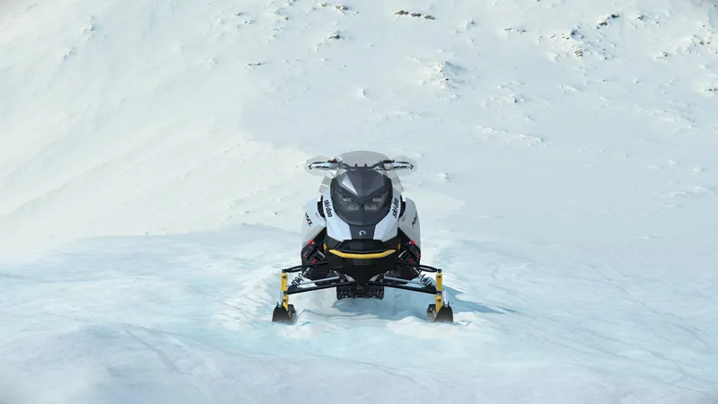 Slide: The Image of 2024 SKI DOO MXZ ADR BLIZZARD 137 850 ETEC snowmobile on snowy terrain. - 7
