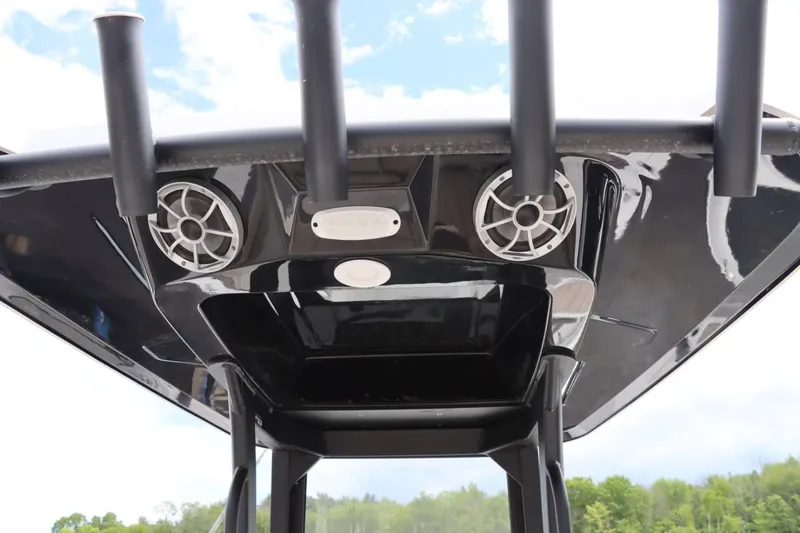 Slide: The Image of 2023 Yamaha Boats 255FSH SPORT E T-top with speakers and rod holders. - 17