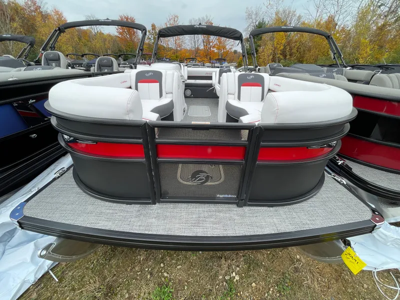 Slide: The Image of 2024 Barletta Corsa 23UC pontoon boat with white seating and red accents. - 6