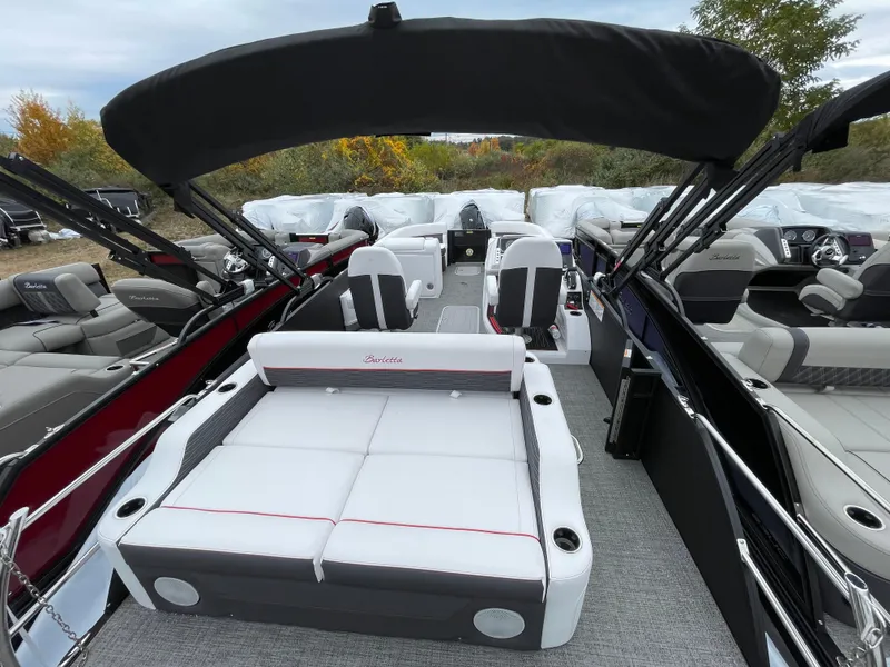 Slide: The Image of 2024 Barletta Corsa 23UC pontoon boat with spacious seating and modern design. - 8