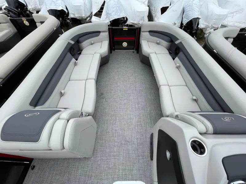 Slide: The Image of 2024 Barletta Cabrio 24UC pontoon boat interior with luxurious seating. - 10