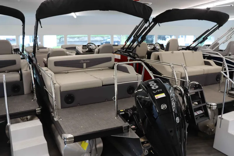 Slide: The Image of 2024 Barletta Cabrio 24UC pontoon boat with V6 engine in showroom. - 4