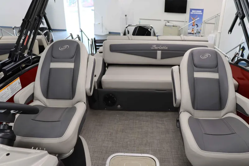 Slide: The Image of 2024 Barletta Cabrio 24UC boat interior with luxurious seating and modern design. - 7