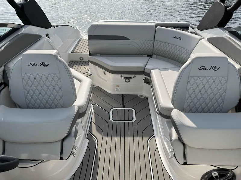 Slide: The Image of 2023 Sea Ray 260SXS boat interior with luxurious seating and elegant design. - 4