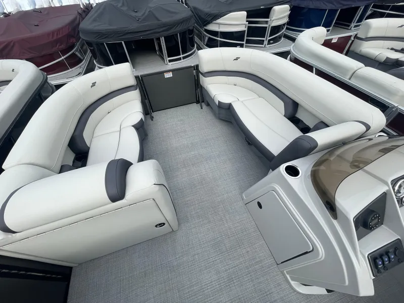 Slide: The Image of 2024 Starcraft EXS 3Q pontoon boat interior with spacious seating. - 11