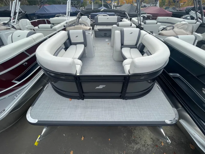 Slide: The Image of 2024 Starcraft EXS 3Q pontoon boat with spacious seating and modern design. - 6