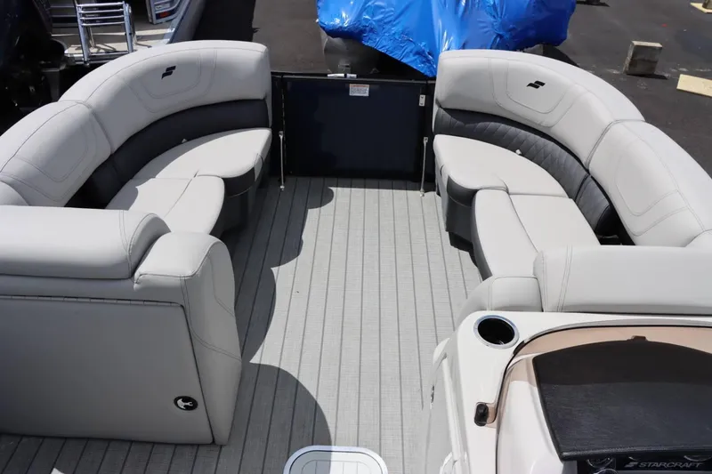 Slide: The Image of 2023 Starcraft CX 23DL Bar pontoon boat interior with luxurious seating. - 17