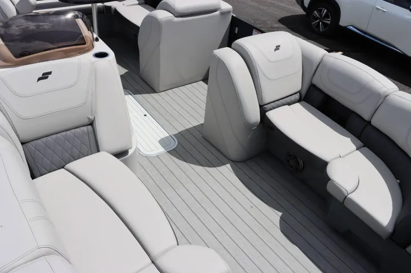 Slide: The Image of 2023 Starcraft CX 23DL Bar boat interior with luxurious seating and modern design. - 18