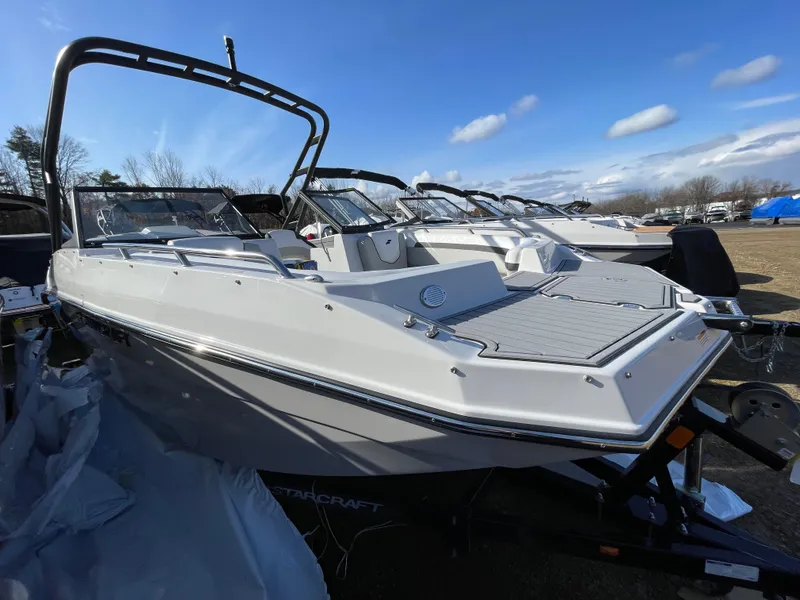 Slide: The Image of 2024 Starcraft SVX 190 OB boat on display under clear blue sky. - 11