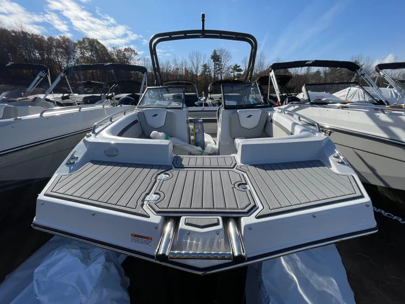 Slide: The Image of 2024 Starcraft SVX 190 OB boat with sleek design and spacious seating. - 14