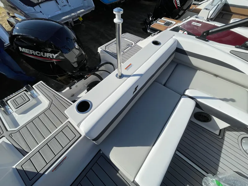 Slide: The Image of 2024 Starcraft SVX 190 OB boat with Mercury outboard motor, rear seating area. - 17