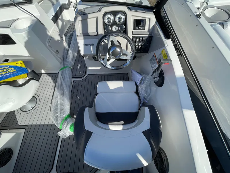 Slide: The Image of 2024 Starcraft SVX 190 OB boat interior with steering wheel and dashboard. - 20