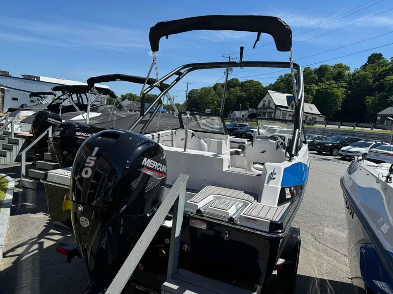 Slide: The Image of 2024 Starcraft SVX 190 OB boat with Mercury 150 outboard motor in a dealership lot. - 5