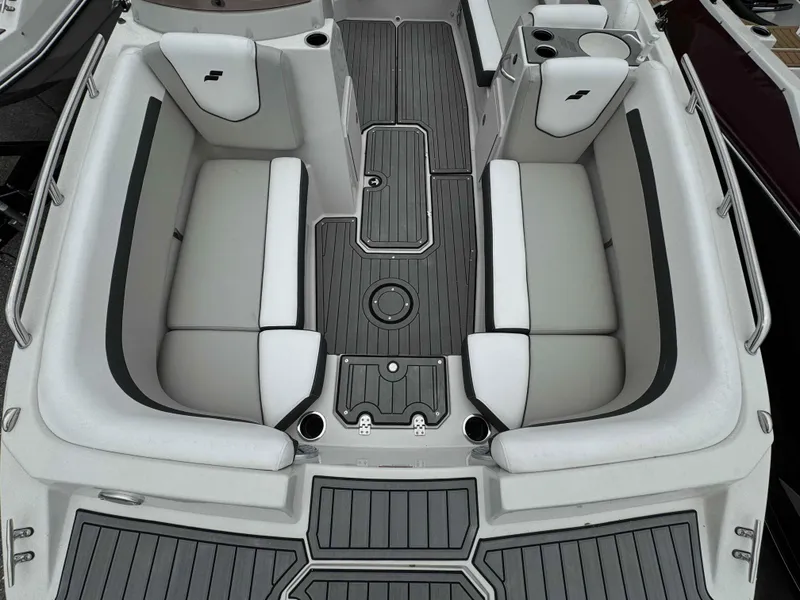 Slide: The Image of 2024 Starcraft SVX 191 OB boat interior with gray seating and black accents. - 18