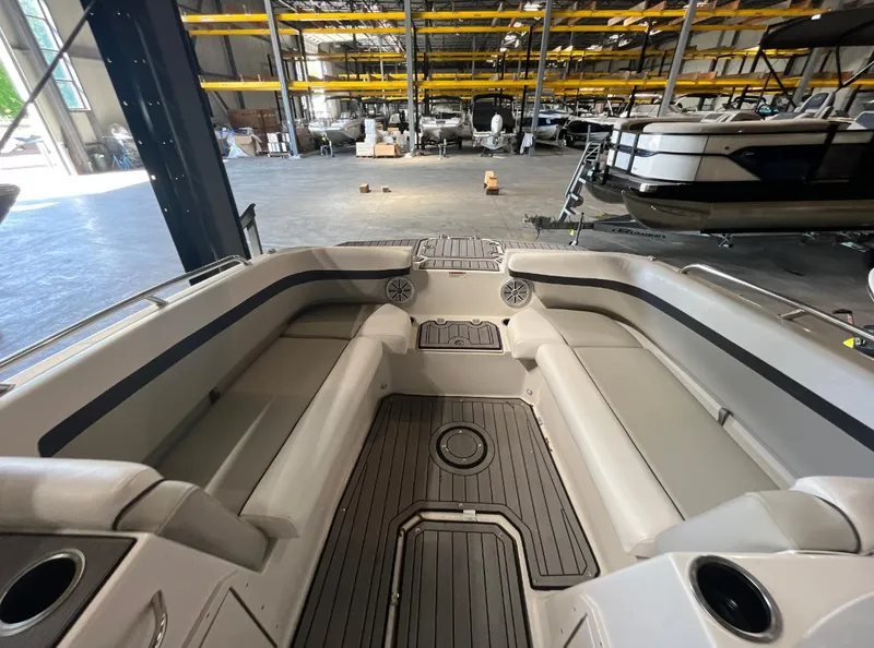 Slide: The Image of Interior view of 2024 Starcraft SVX 191 OB boat in a storage facility. - 9