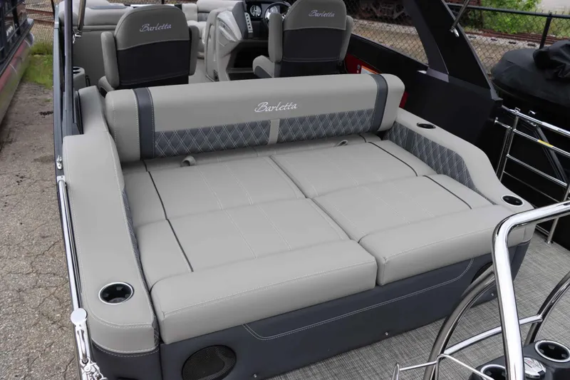 Slide: The Image of 2023 Barletta Lusso 23UCA pontoon boat with luxurious seating and cup holders. - 15