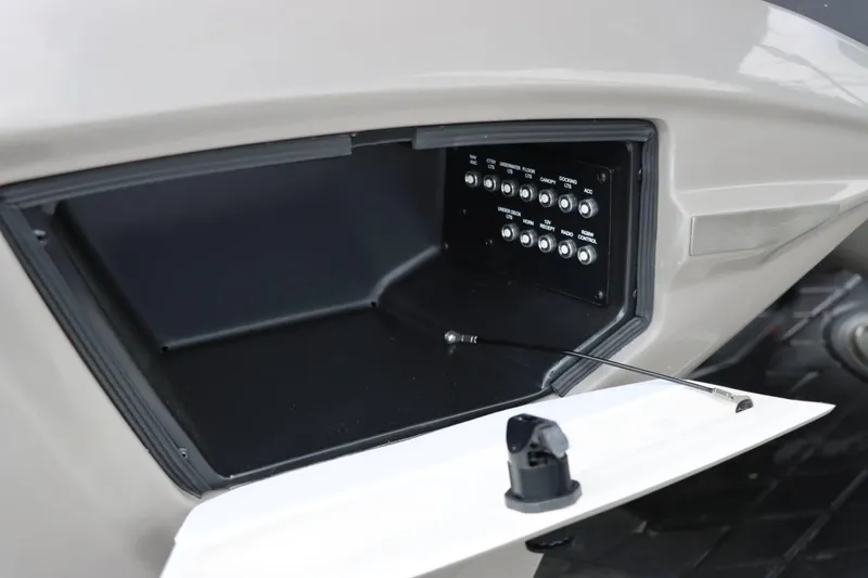 Slide: The Image of 2023 Barletta Lusso 23UCA control panel with open compartment. - 21