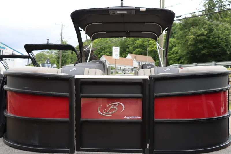 Slide: The Image of 2023 Barletta Lusso 23UCA pontoon boat, rear view with red and black design. - 4