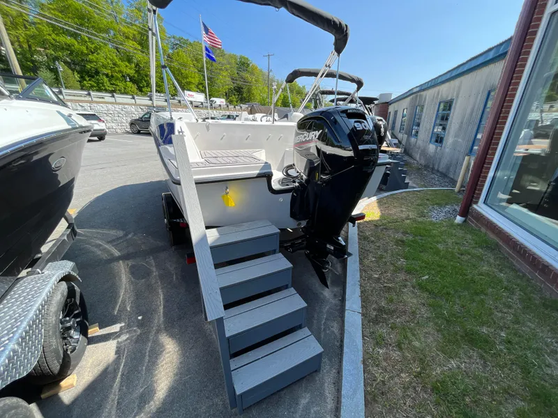 Slide: The Image of 2023 Starcraft SVX 171 OB boat with Mercury outboard motor on display. - 2
