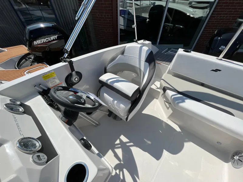Slide: The Image of 2023 Starcraft SVX 171 OB boat interior with Mercury outboard motor. - 3