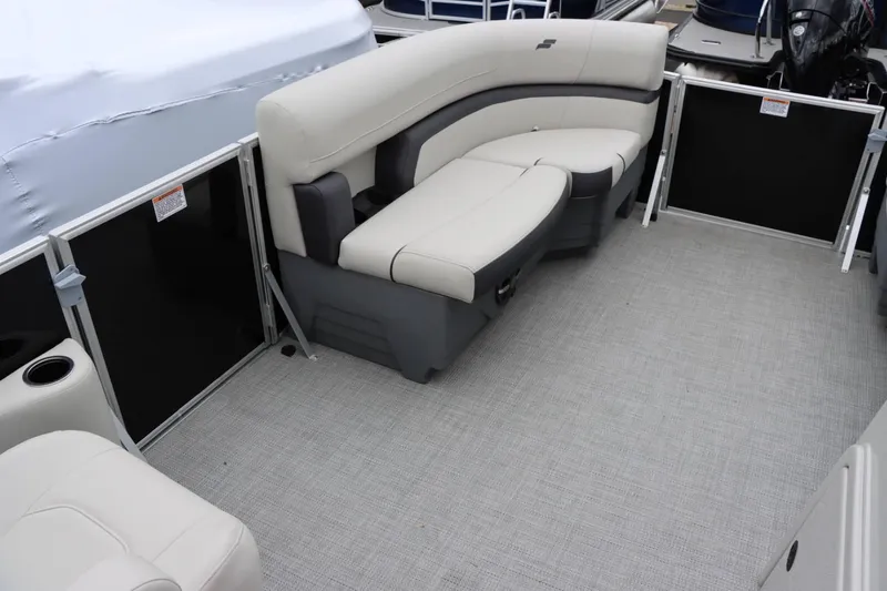 Slide: The Image of 2024 Starcraft EX 20R pontoon boat interior with spacious seating. - 18