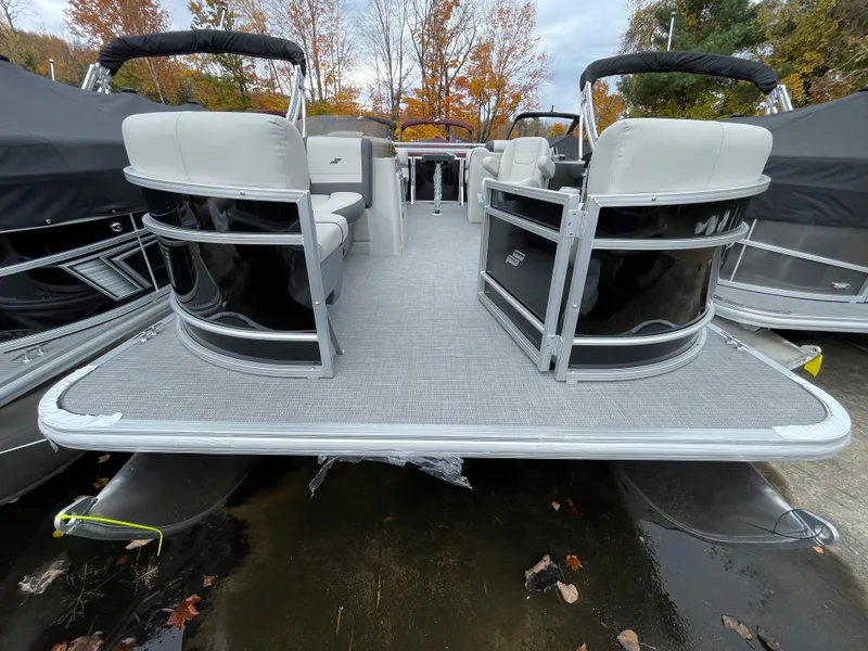 Slide: The Image of 2024 Starcraft EX 20R pontoon boat with spacious seating and modern design. - 6