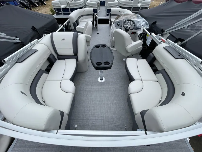 Slide: The Image of 2024 Starcraft EX 20R pontoon boat interior with spacious seating and modern design. - 9