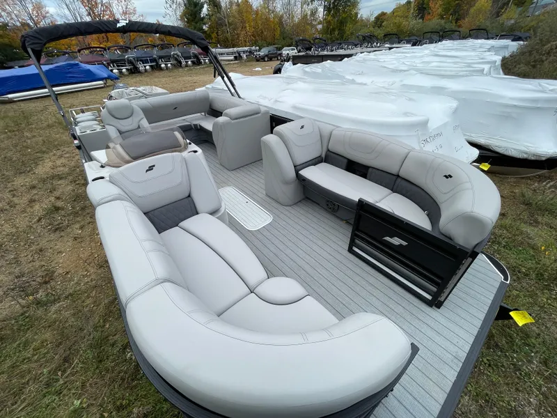 Slide: The Image of 2023 Starcraft CX 25DL BAR pontoon boat with spacious seating and modern design. - 10