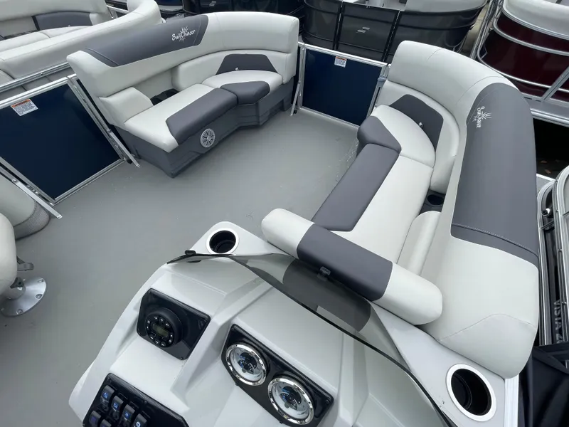 Slide: The Image of 2023 SunChaser GENEVA 20LR DH pontoon boat interior with plush seating and modern dashboard. - 6