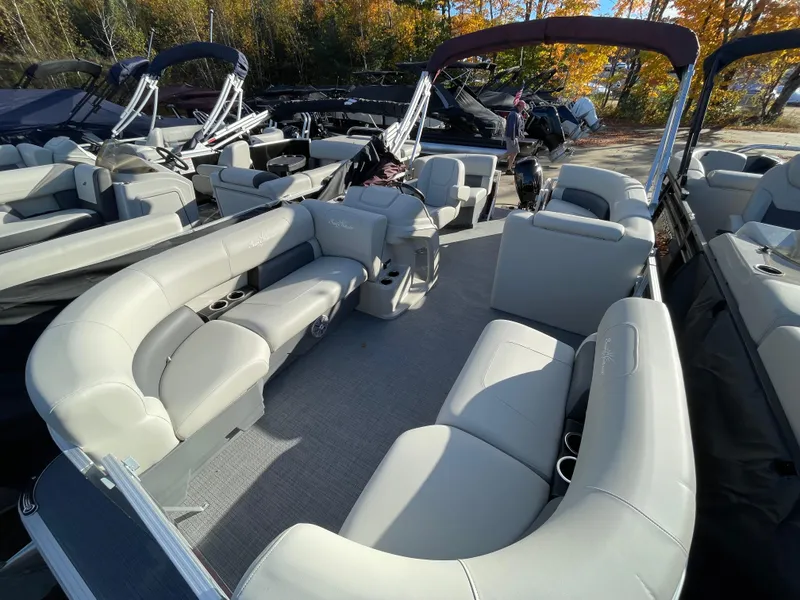 Slide: The Image of 2024 SunChaser VISTA 18LR pontoon boat with spacious seating and modern design. - 13