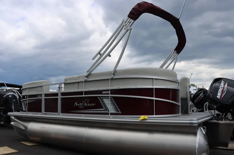 Slide: The Image of 2024 SunChaser VISTA 18LR pontoon boat with Mercury outboard motor. - 3