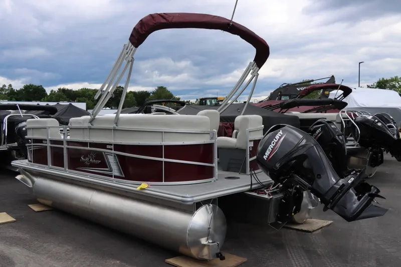 Slide: The Image of 2024 SunChaser VISTA 18LR pontoon boat with Mercury outboard motor. - 4