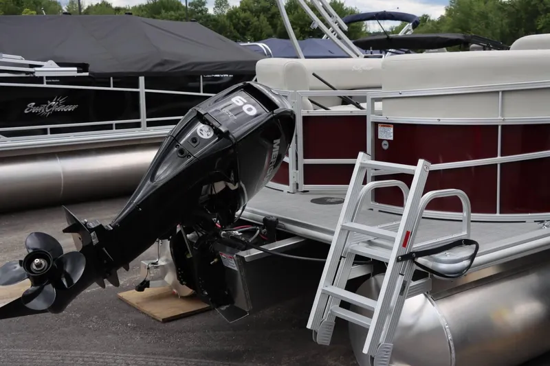 Slide: The Image of 2024 SunChaser VISTA 18LR pontoon boat with Mercury 60 HP outboard motor. - 6