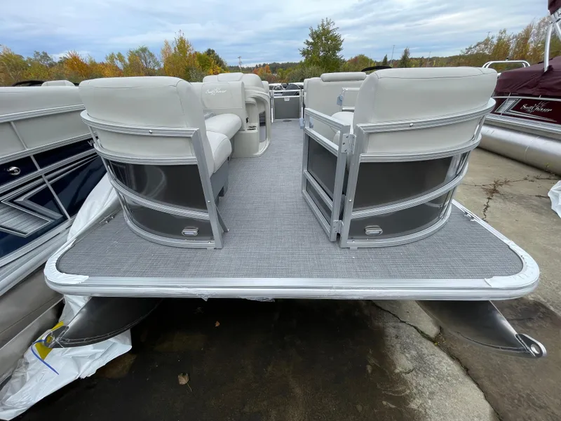 Slide: The Image of 2024 SunChaser VISTA 18LR pontoon boat with spacious seating and modern design. - 2