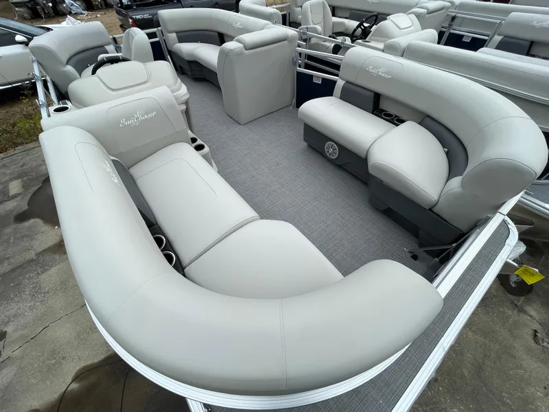 Slide: The Image of 2024 SunChaser VISTA 18LR pontoon boat with spacious seating and modern design. - 8