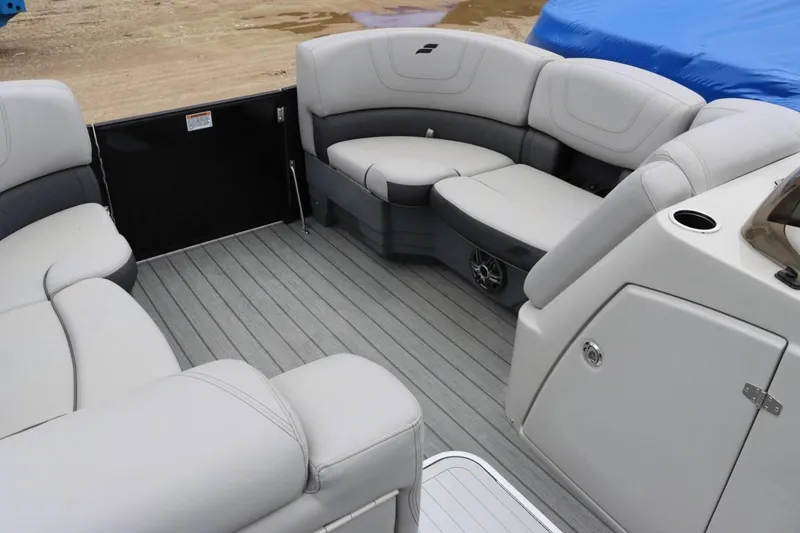 Slide: The Image of Interior of 2023 Starcraft SLS 3 pontoon boat with gray seating and flooring. - 12